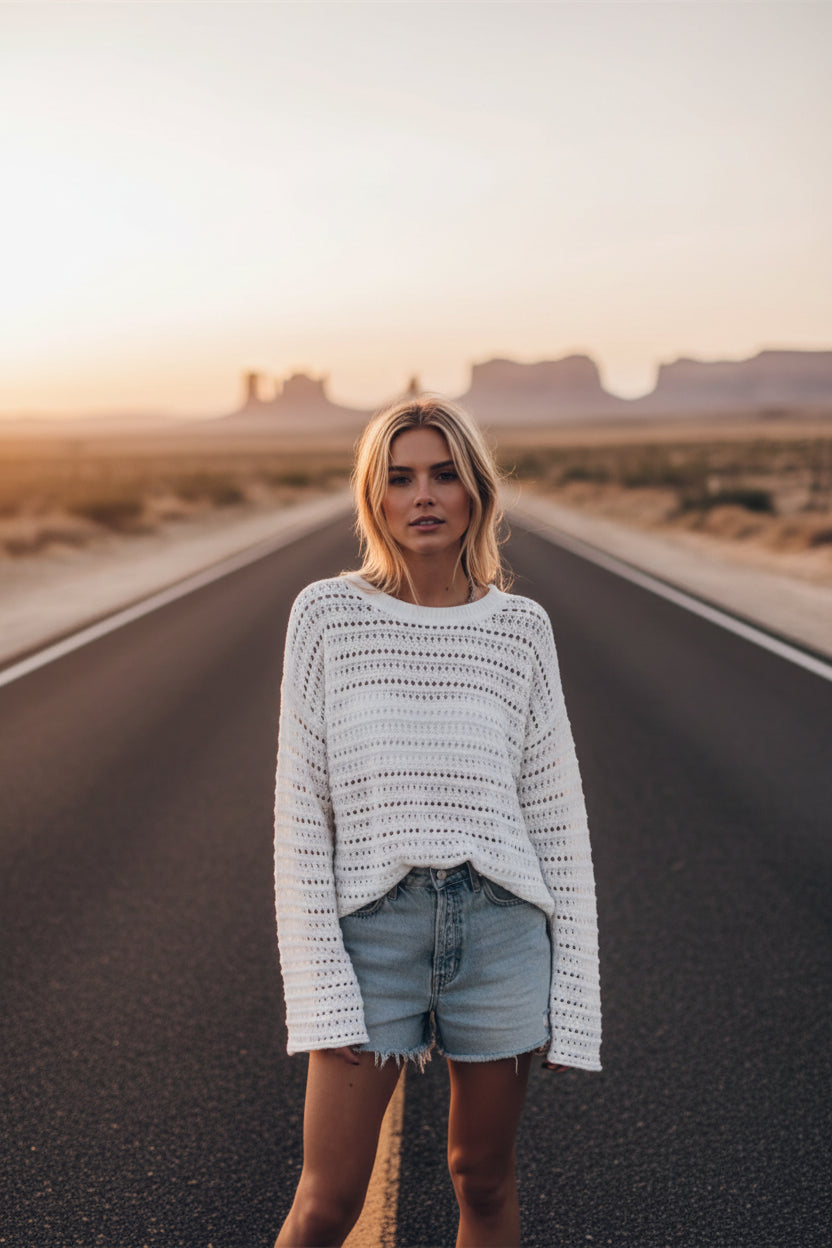 BELLA openwork round neck dropped shoulder knit top with a stylish, airy design and relaxed fit, perfect for casual wear.