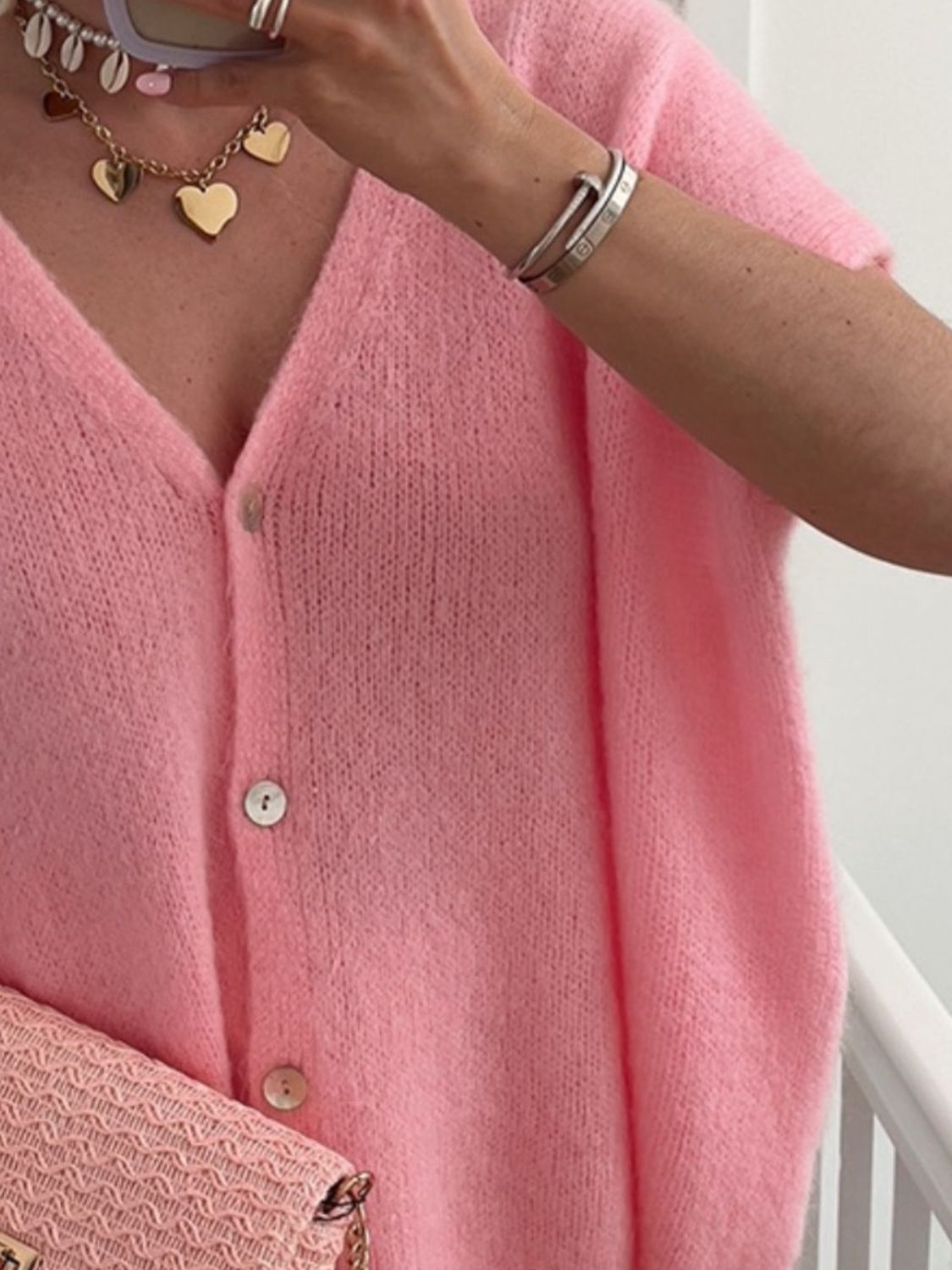 BELLA V-neck button-up short sleeve cardigan from Trendsi, soft knit fabric with front buttons, casual and stylish for everyday wear.