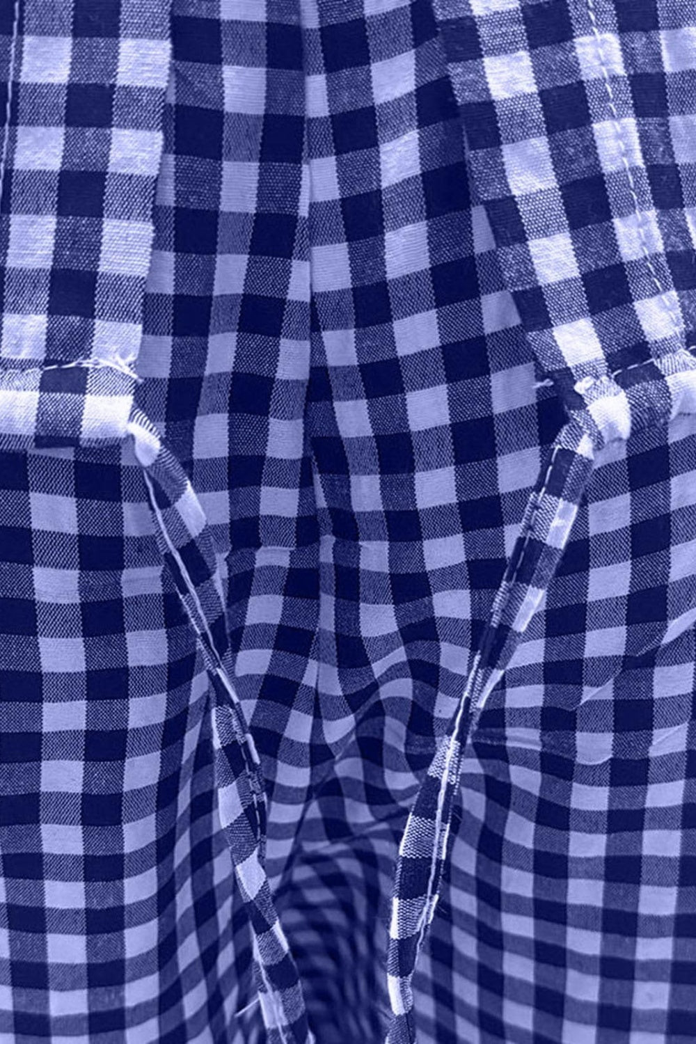 BELLA plaid round neck half sleeve top and matching pants set, featuring a classic checkered pattern and comfortable fit.