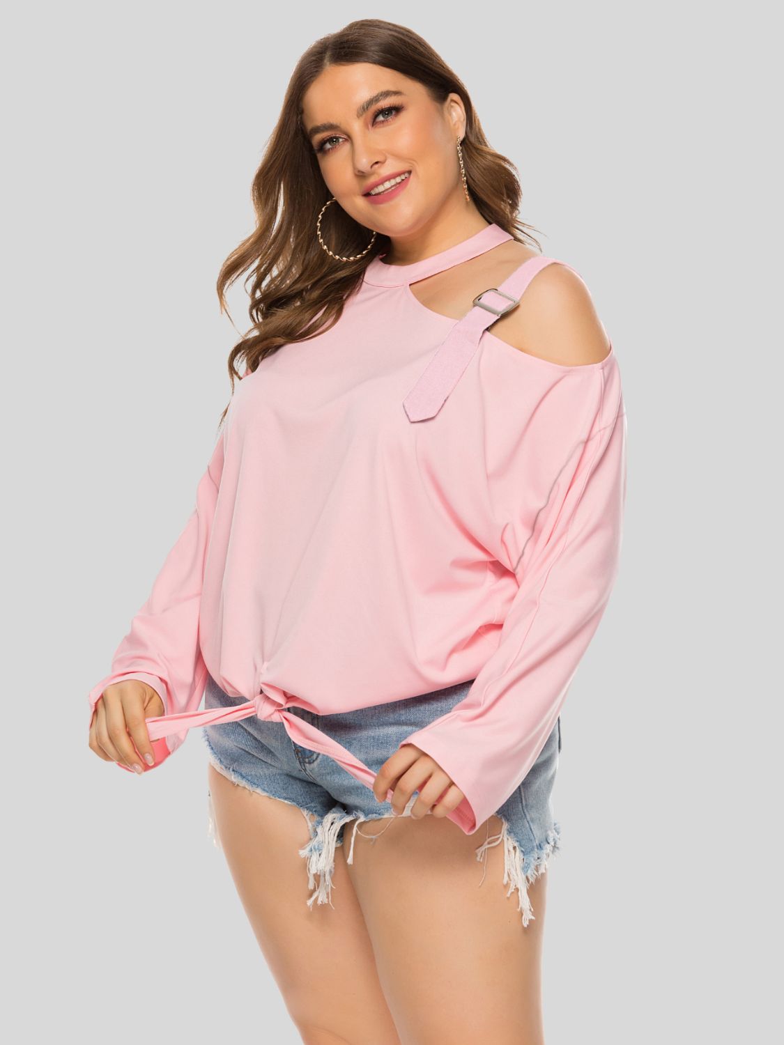 Plus size cold-shoulder tied top by BELLA featuring ruffled sleeves and a relaxed fit, shown in a trendy casual style.