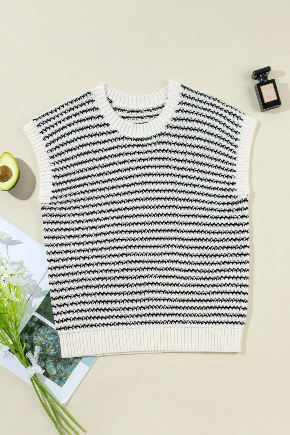 Bella Striped Round Neck Sweater Vest with horizontal stripes, close-up of the cozy knit fabric and classic fit.