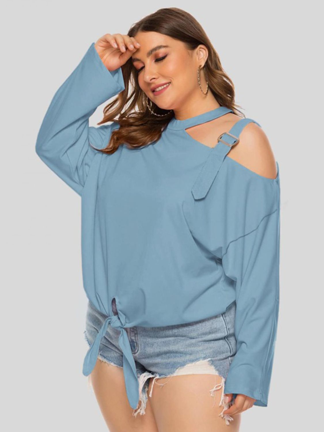 Plus size cold-shoulder tied top by BELLA, featuring trendy design with ruffled sleeves and a relaxed fit.