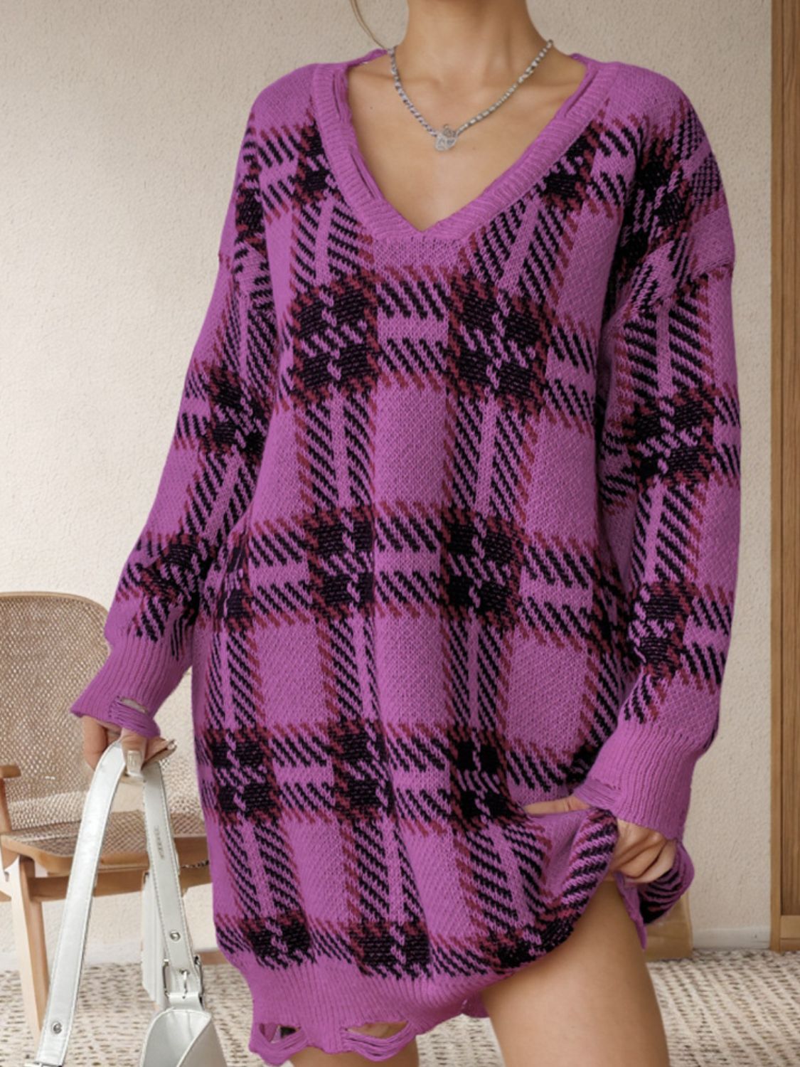 BELLA BLA distressed plaid V-neck long sleeve sweater dress, featuring a cozy, casual style with a distressed plaid pattern.