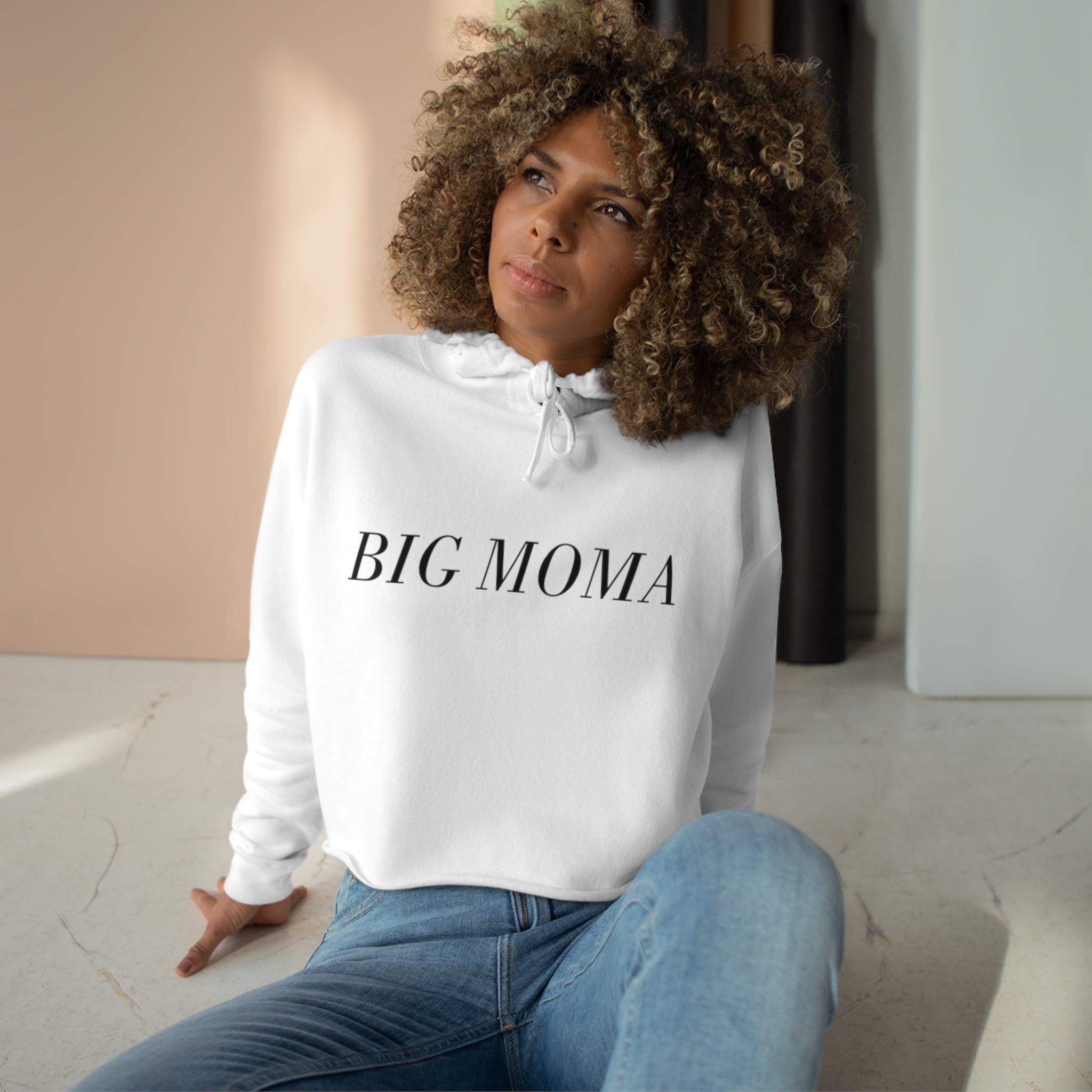 BELLA Big MOMA Hoodie in soft fabric, featuring a relaxed fit with bold graphic design on the front.