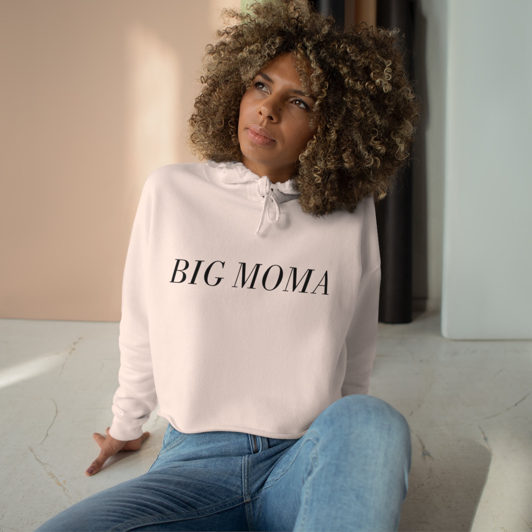BELLA Big MOMA Hoodie in soft fabric with front pocket and drawstring hood, styled in a casual, comfortable fit.