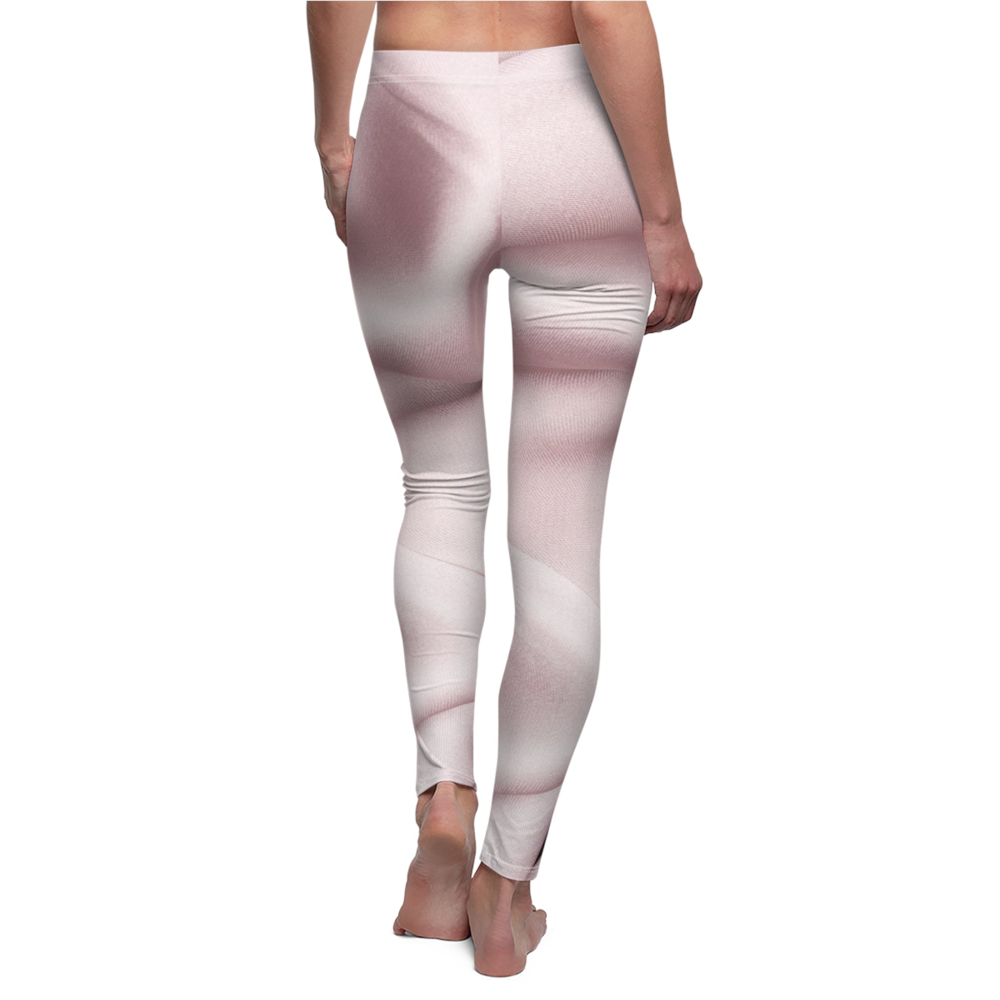 Pale pink abstract print leggings by BELLA featuring colorful, artistic patterns on soft, stretchy fabric.
