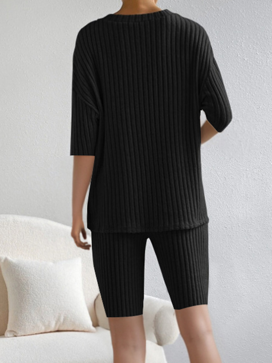 BELLA ribbed V-neck top and shorts set from trendsi, featuring a fitted V-neck top and matching high-waist shorts in ribbed fabric.