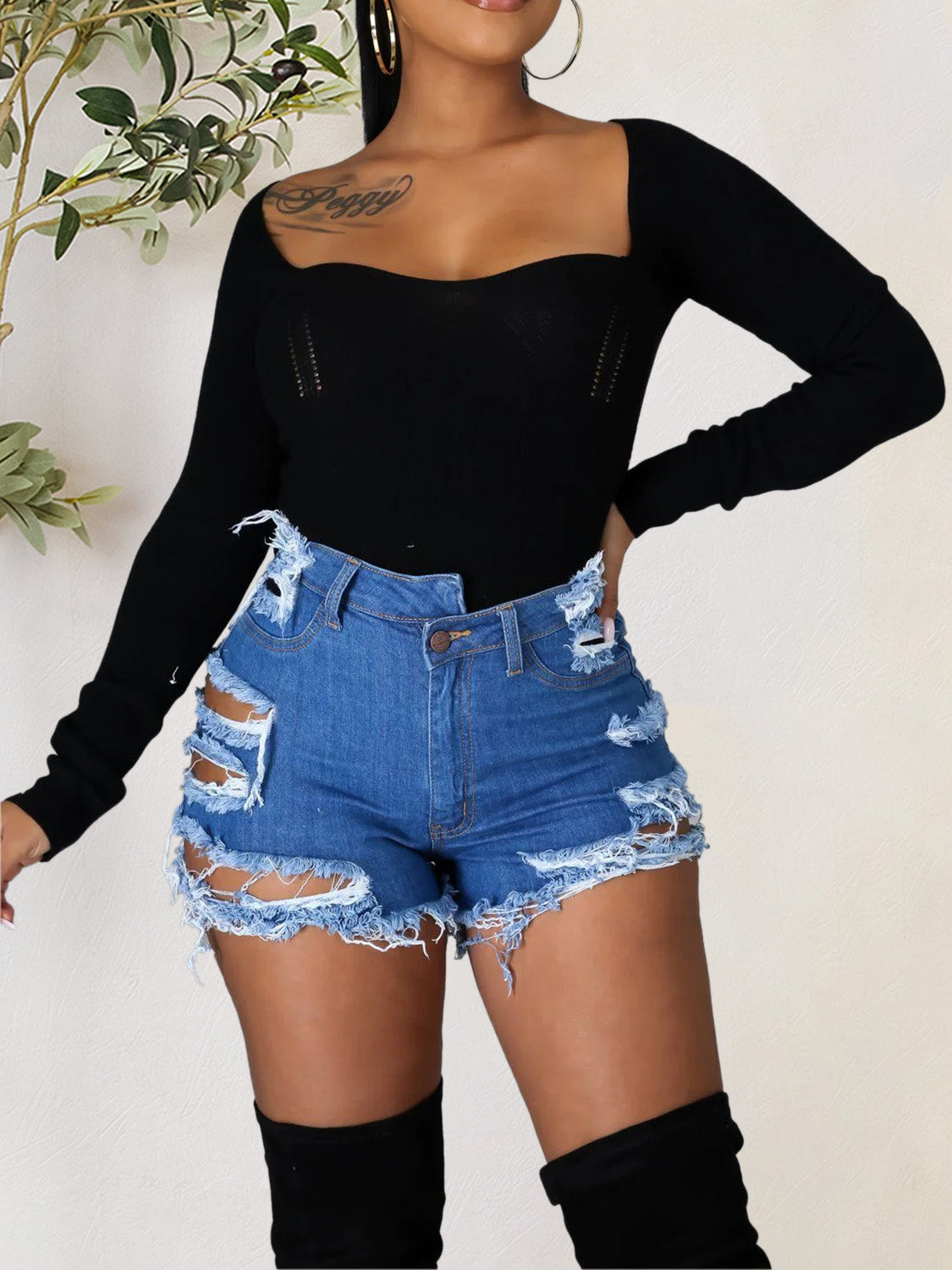 BELLA distressed raw hem denim shorts with pockets, showcasing a stylish casual look and frayed hem detail.