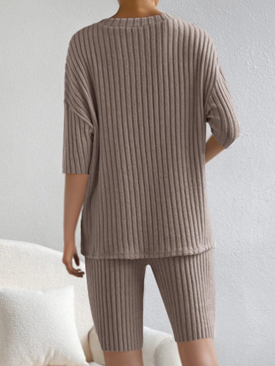 BELLA trendsi ribbed V-neck top and shorts set in soft fabric, featuring a fitted V-neck top and matching high-waist shorts.
