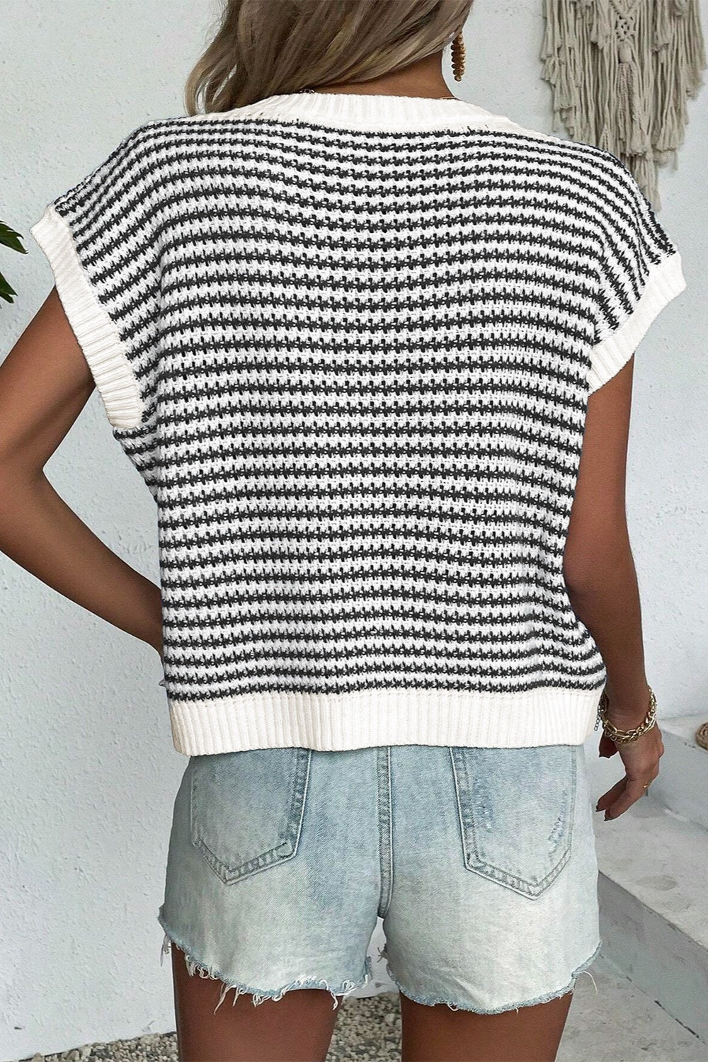 BELLA striped round neck sweater vest featuring bold horizontal stripes and a classic fit, perfect for layered casual outfits.