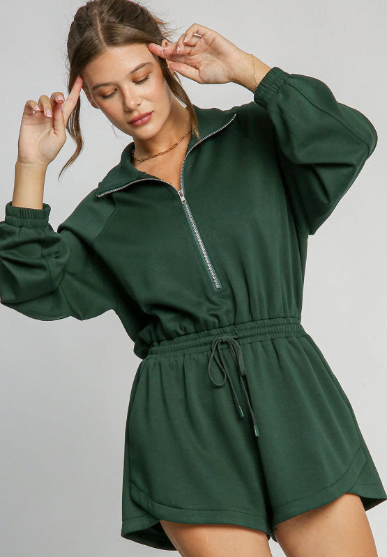 BELLA trendsi drawstring half zip long sleeve romper in black, featuring a casual fit with a drawstring waist and zip detail.