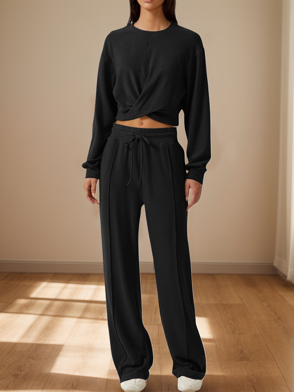 BELLA trendsi crisscross round neck top and drawstring pants set, stylish casual outfit, featuring a fitted top and relaxed pants.