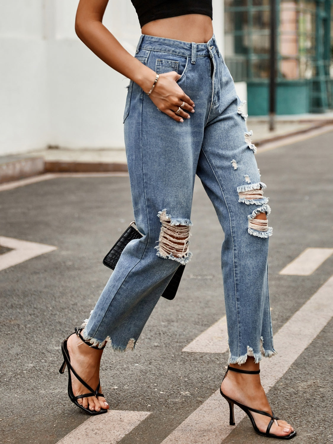 Distressed raw hem jeans by BELLA BLA featuring a trendy fit, ripped details, and a casual, stylish look.