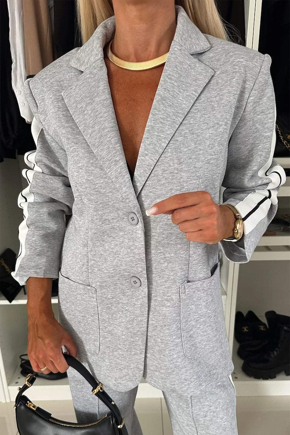 BELLA trendsi full size contrast lapel collar top and pants set, featuring stylish design and comfortable fit, shown on a model.