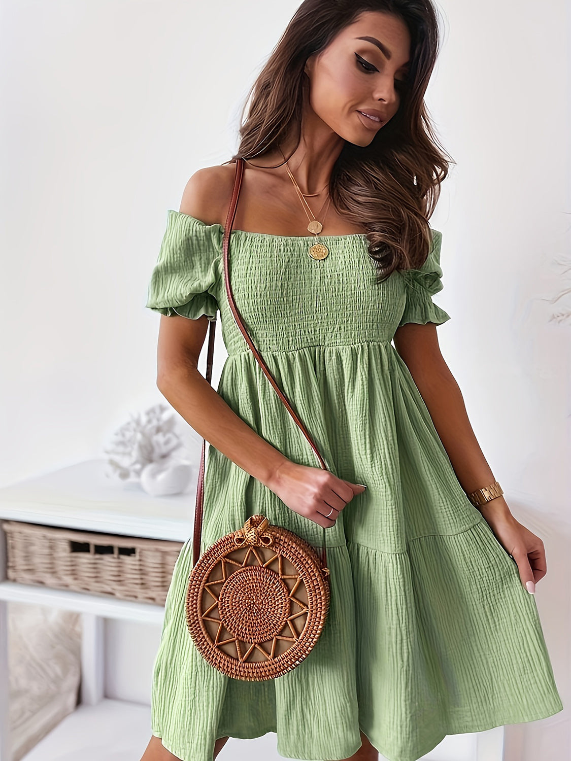 BELLA trendsi full size ruffled off-shoulder short sleeve dress displayed on a mannequin with a flowing, feminine design.