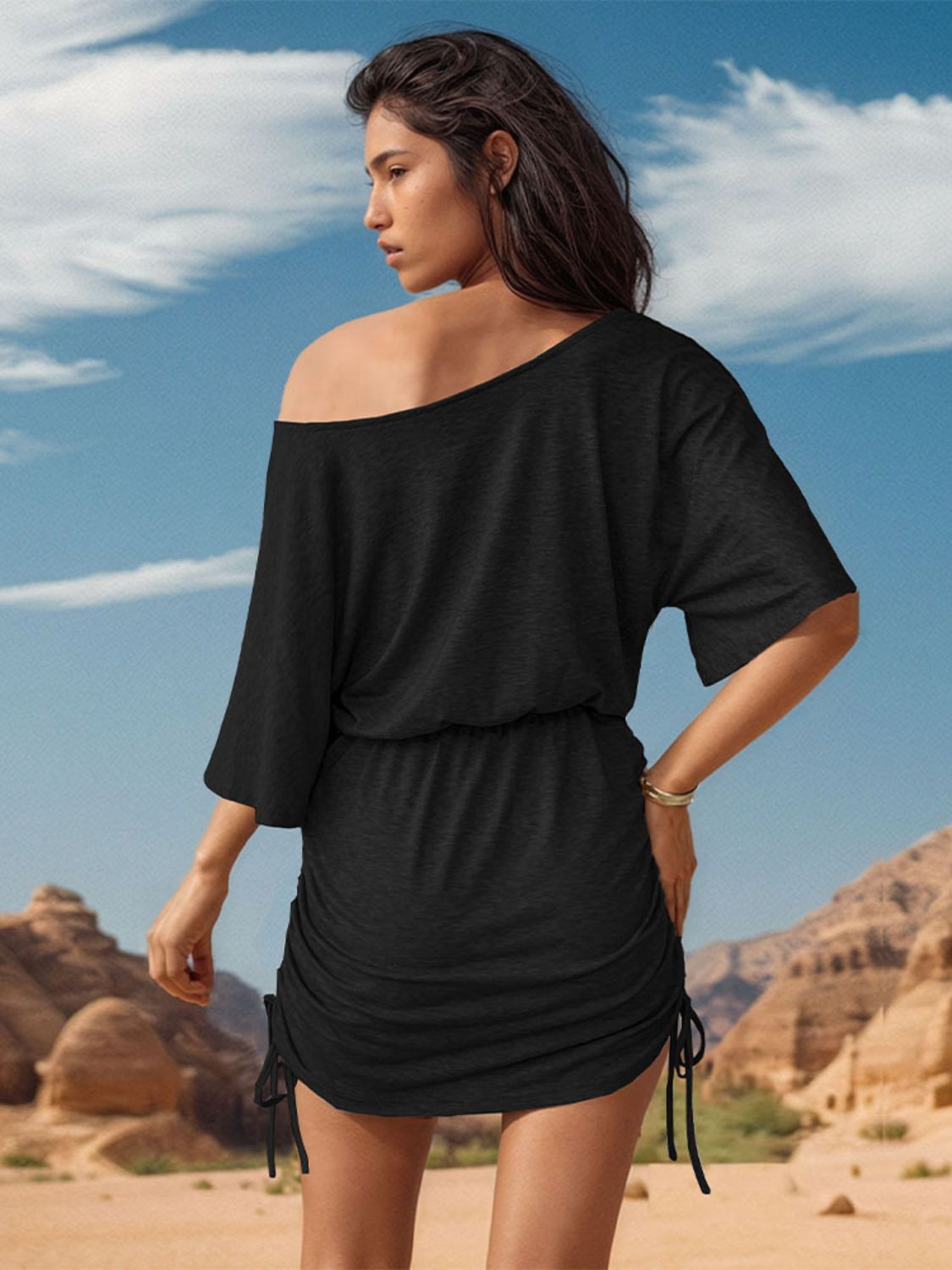 Black BELLA BLA one shoulder mini dress from Trendsi, featuring a stylish asymmetrical neckline and fitted silhouette.