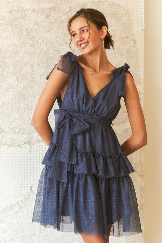 BELLA Trendsi tie shoulder polka dot mesh dress featuring a feminine design with adjustable straps and lightweight fabric.
