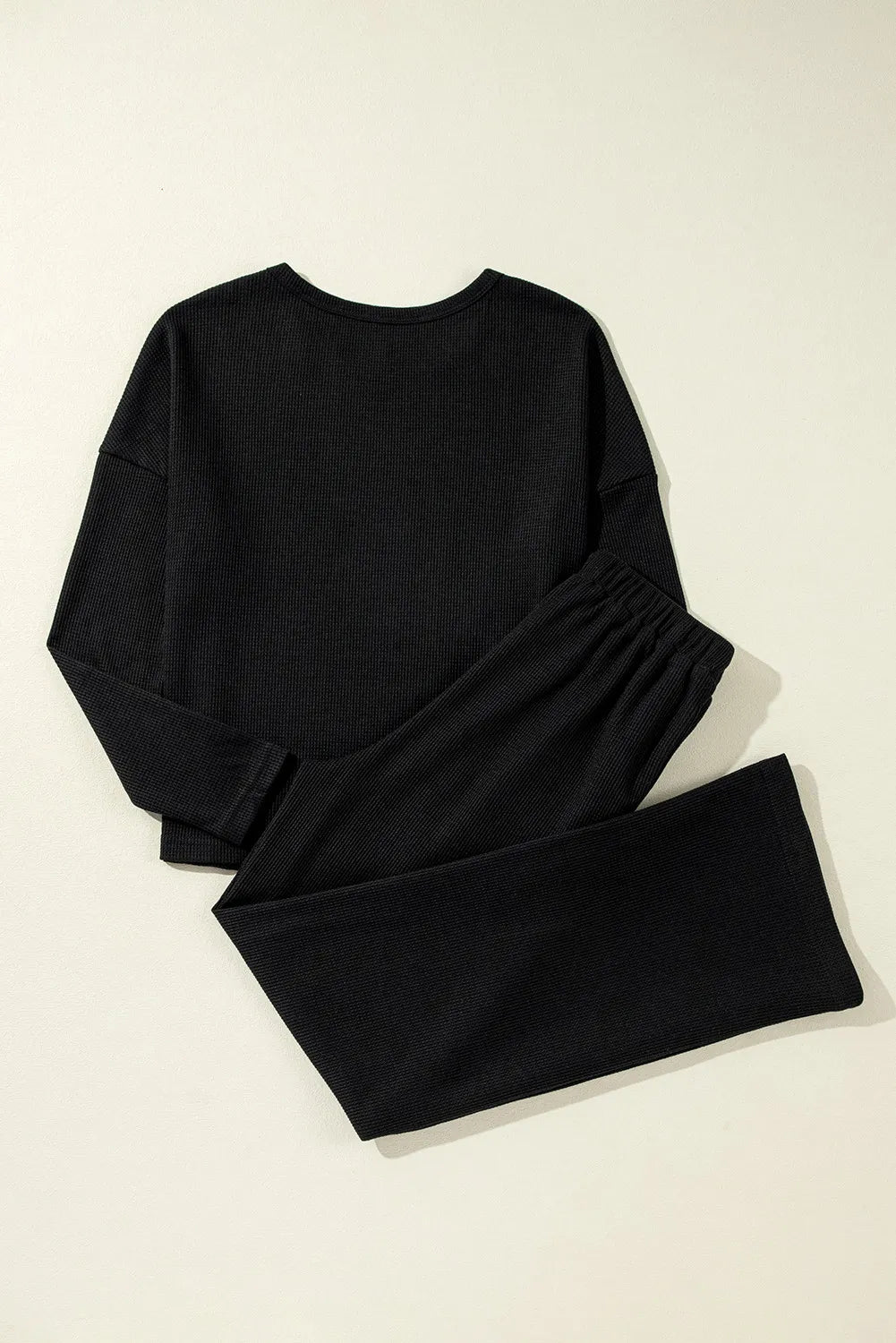 BELLA BLA lounge set with a cozy top and drawstring pants, featuring a relaxed fit and soft fabric for comfortable casual wear.