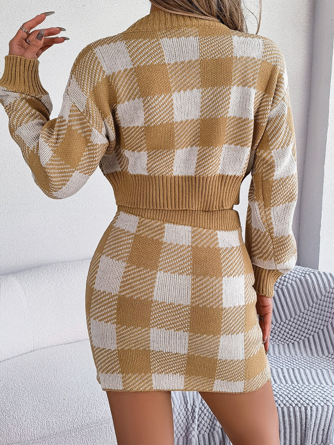 BELLA plaid round neck top and skirt sweater set, trendy matching outfit with a classic plaid pattern and cozy knit fabric.