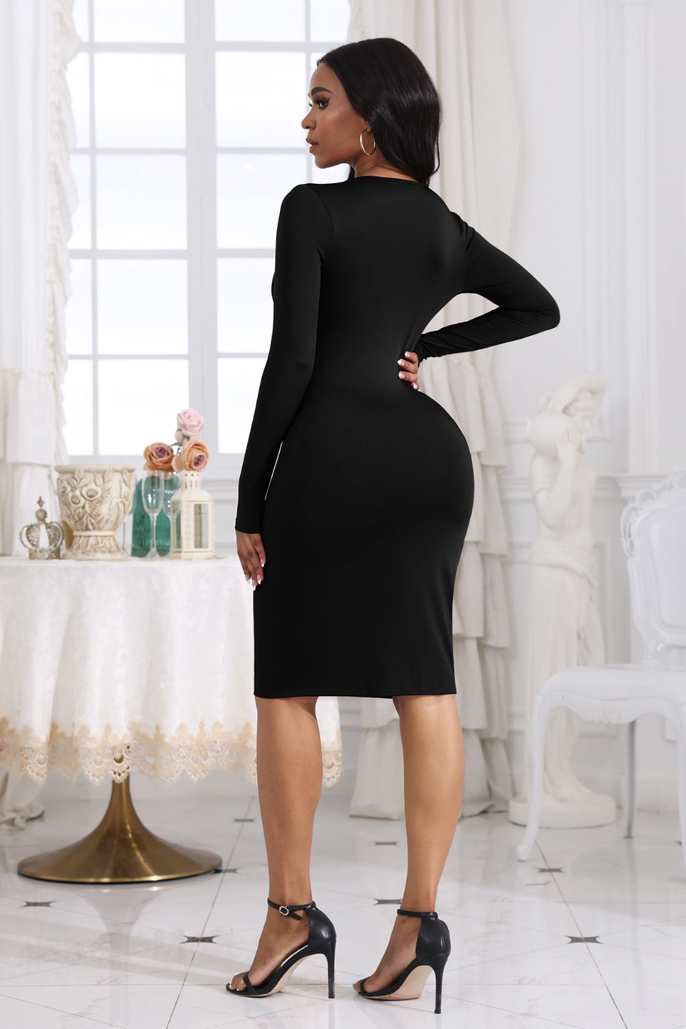 BELLA BLA twisted long sleeve dress with cutout design, featuring a trendy silhouette and stylish details.