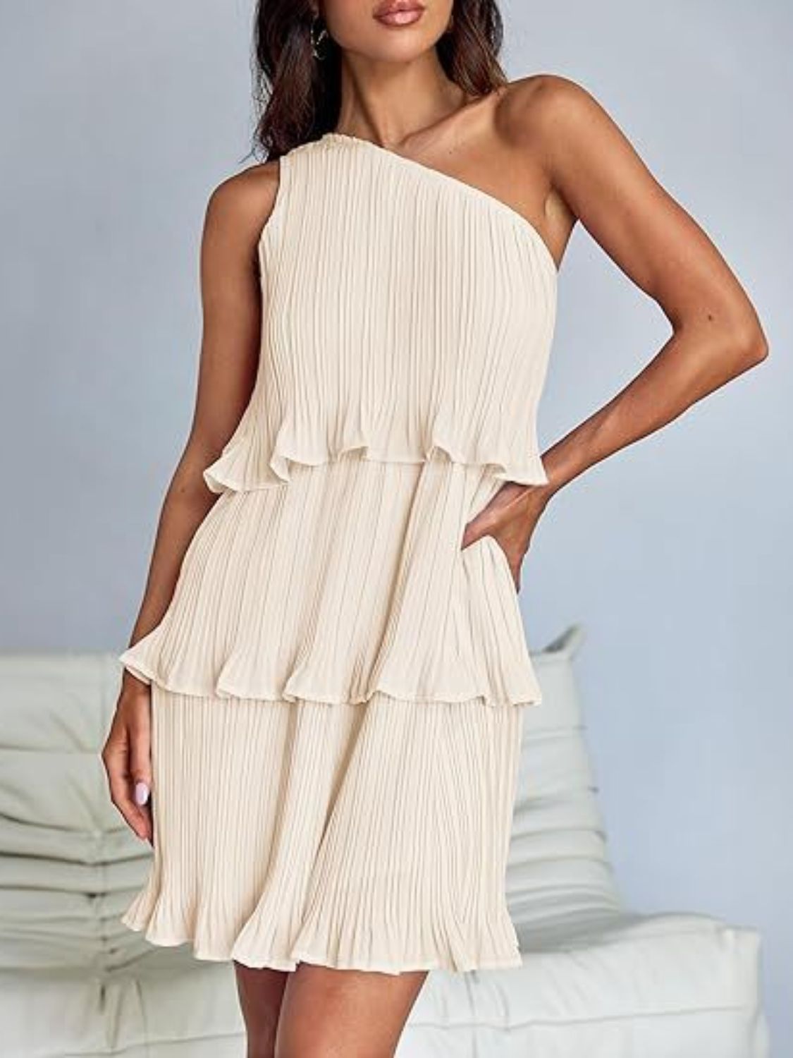BELLA layered single shoulder mini dress from trendsi, featuring a stylish design with a unique shoulder detail and fitted silhouette.