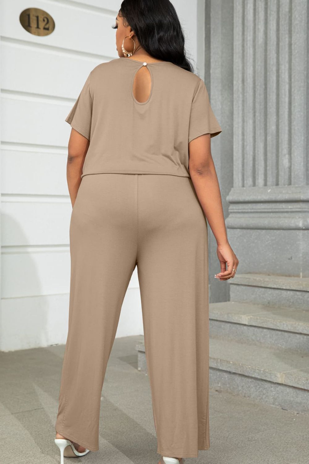 Plus size BELLA drawstring waist short sleeve jumpsuit, casual summer romper with comfortable fit and stylish design.