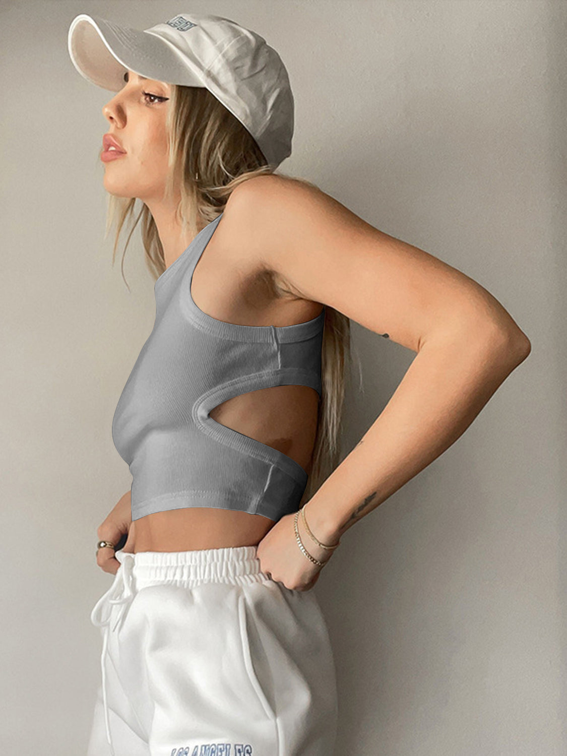 BELLA BLA trendsi cutout round neck tank top in black, showcasing a close-up of the stylish neckline and fabric texture.