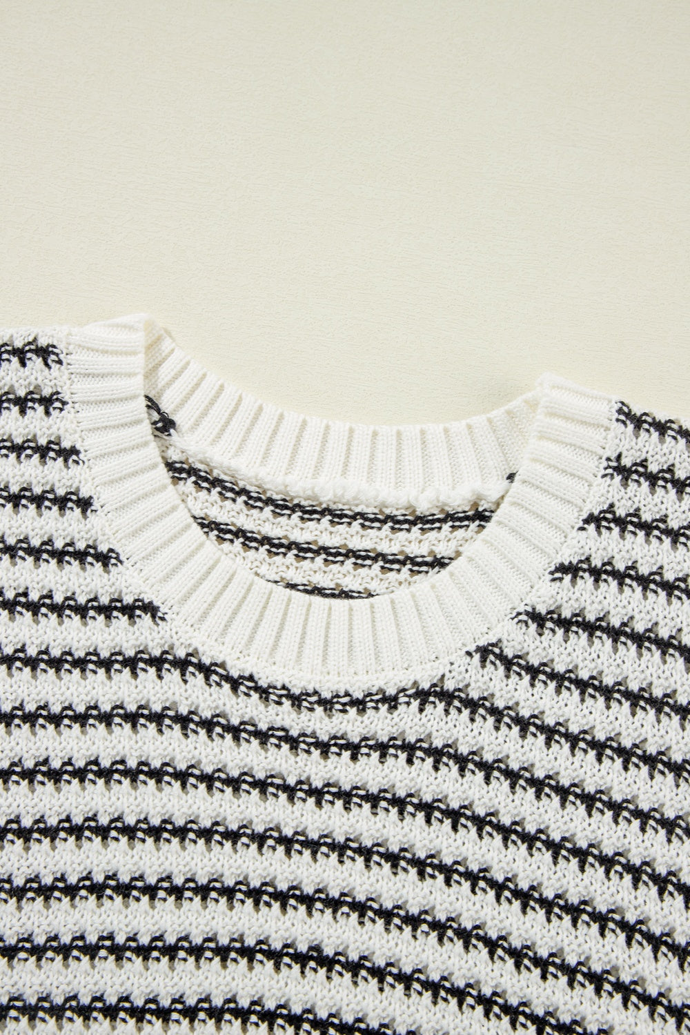 BELLA striped round neck sweater vest from trendsi featuring a classic pattern and comfortable fit, displayed on a neutral background.