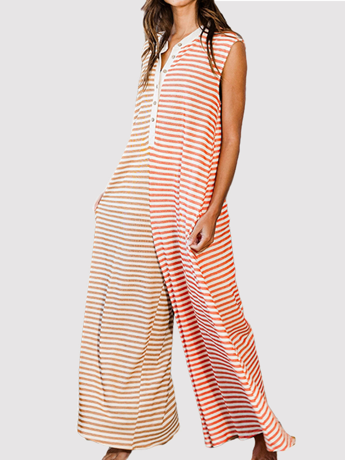 Striped round neck sleeveless jumpsuit by BELLA featuring a fitted bodice and wide-leg pants, perfect for casual or summer wear.