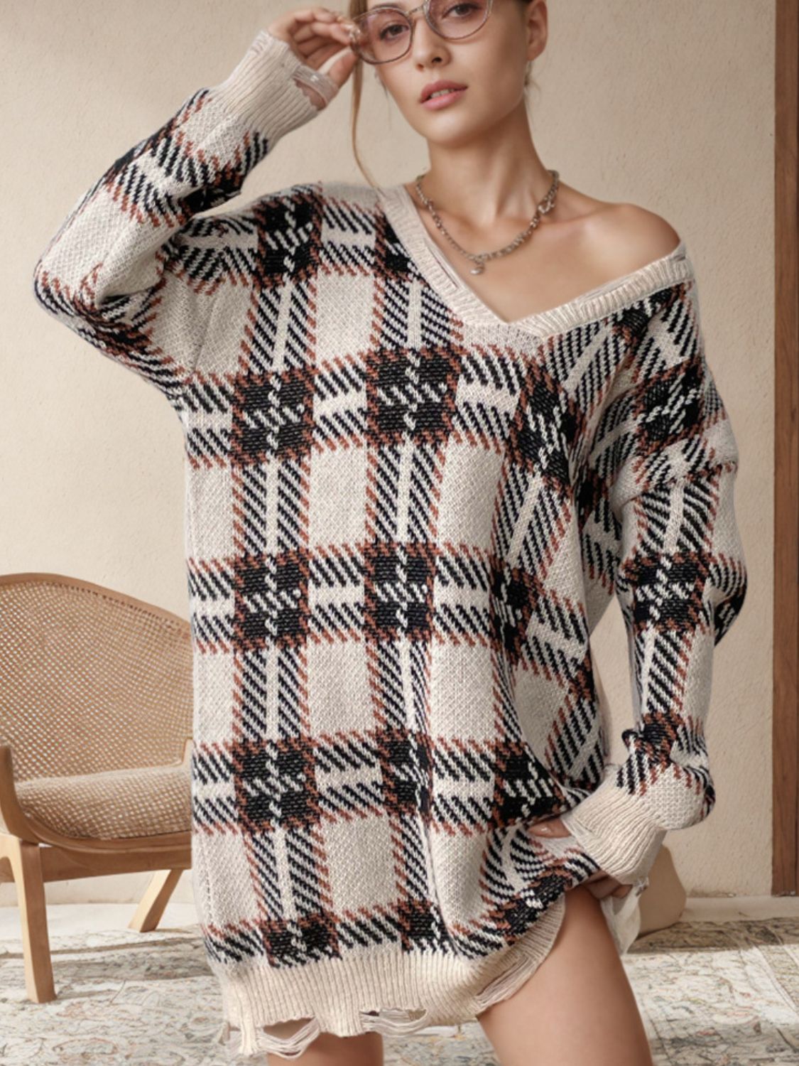 BELLA BLA distressed plaid V-neck long sleeve sweater dress with a relaxed fit and casual style, featuring a distressed plaid pattern.