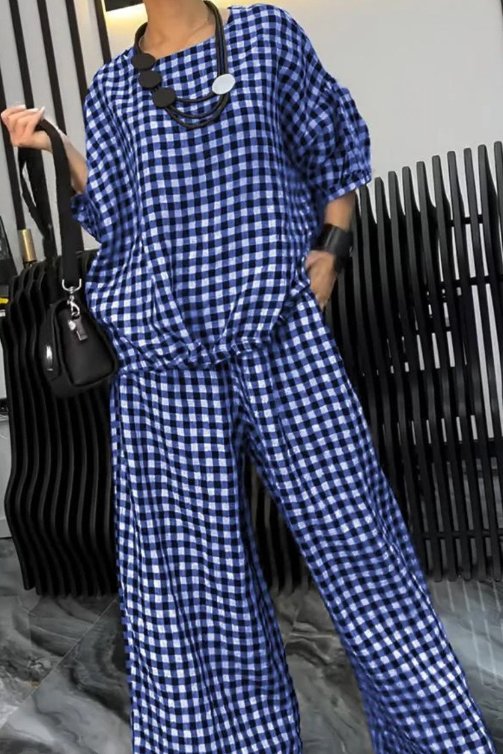 BELLA plaid round neck half-sleeve top and matching pants set, stylish casual outfit with a trendy pattern and comfortable fit.
