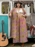 Plus size printed open front cover-up and pants set by BELLA, featuring colorful floral pattern and relaxed fit.
