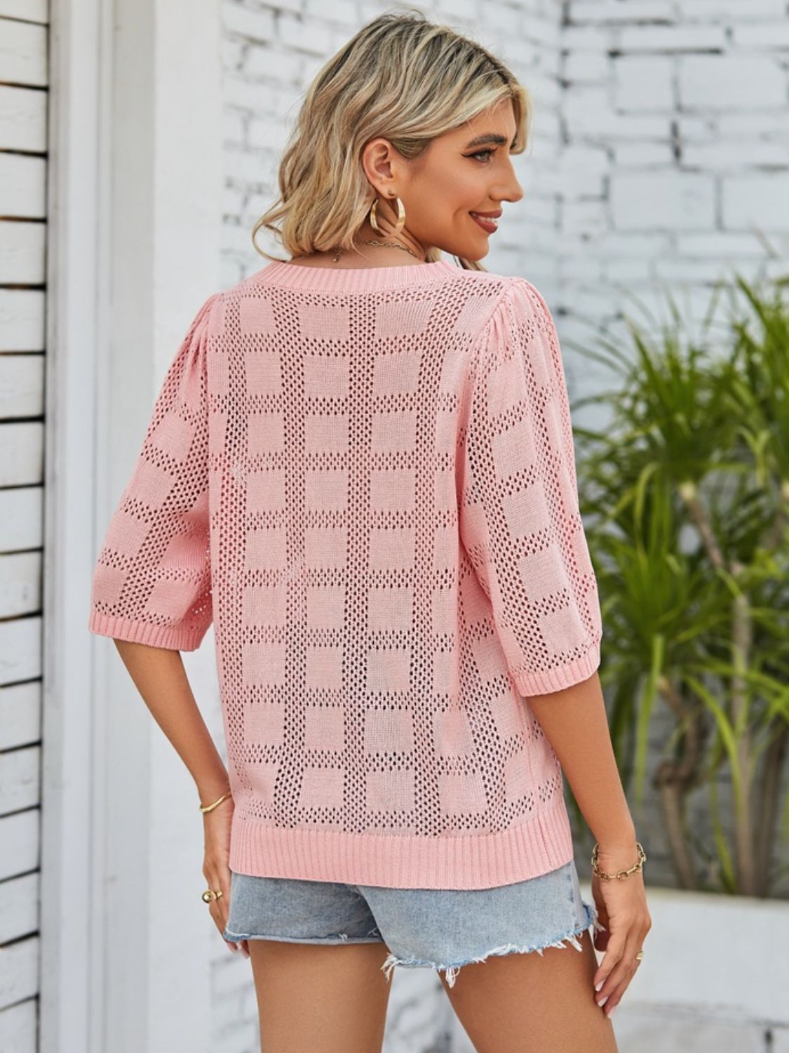 BELLA openwork round neck knit top featuring intricate knit pattern and lightweight fabric, perfect for casual or layered looks.