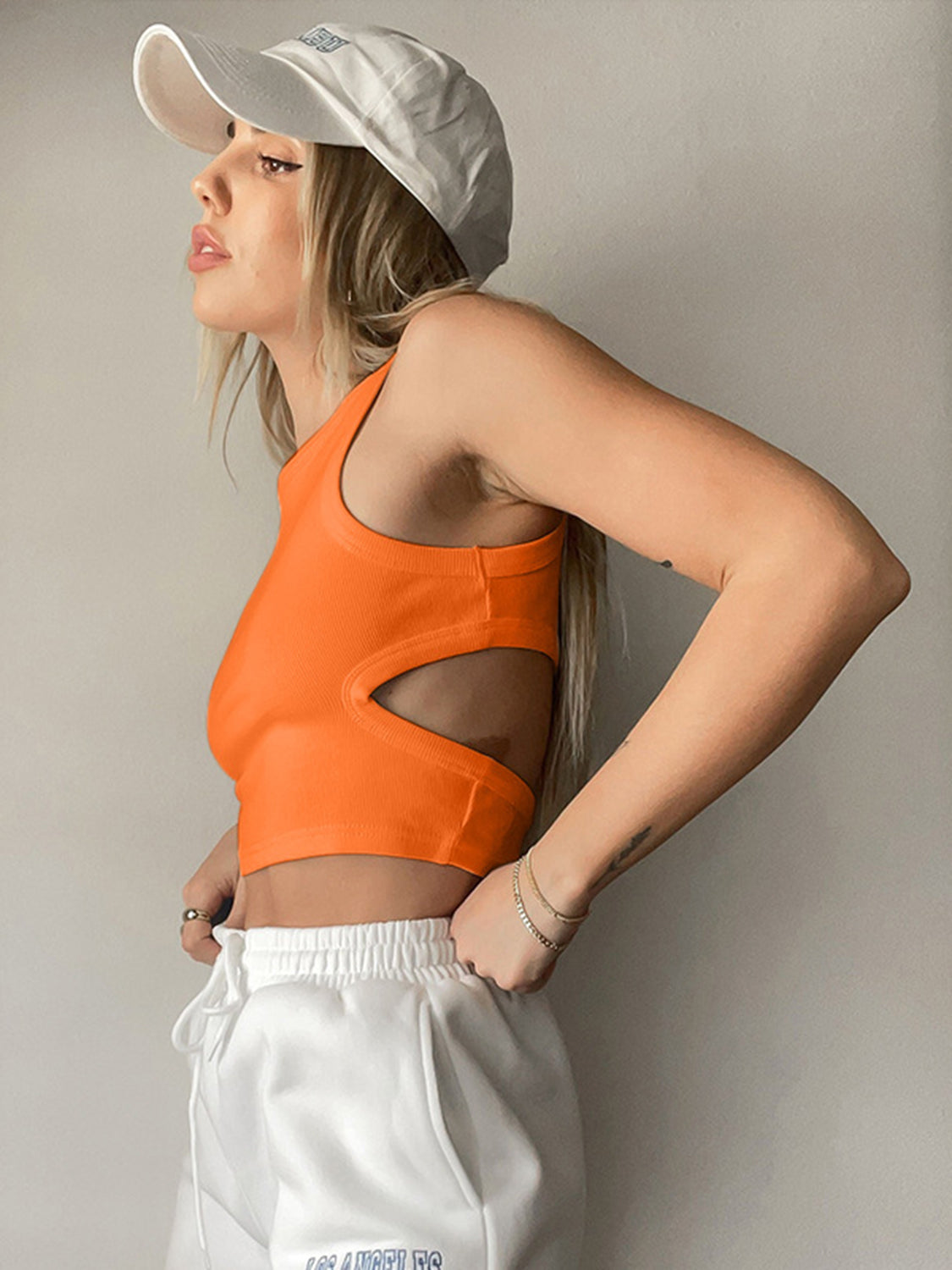 BELLA BLA trendsi cutout round neck tank top in neutral fabric, featuring a stylish round neckline and cutout detail.