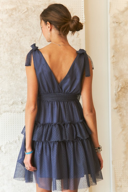 BELLA trendsi tie shoulder polka dot mesh dress featuring a stylish design with adjustable shoulder ties and sheer fabric.