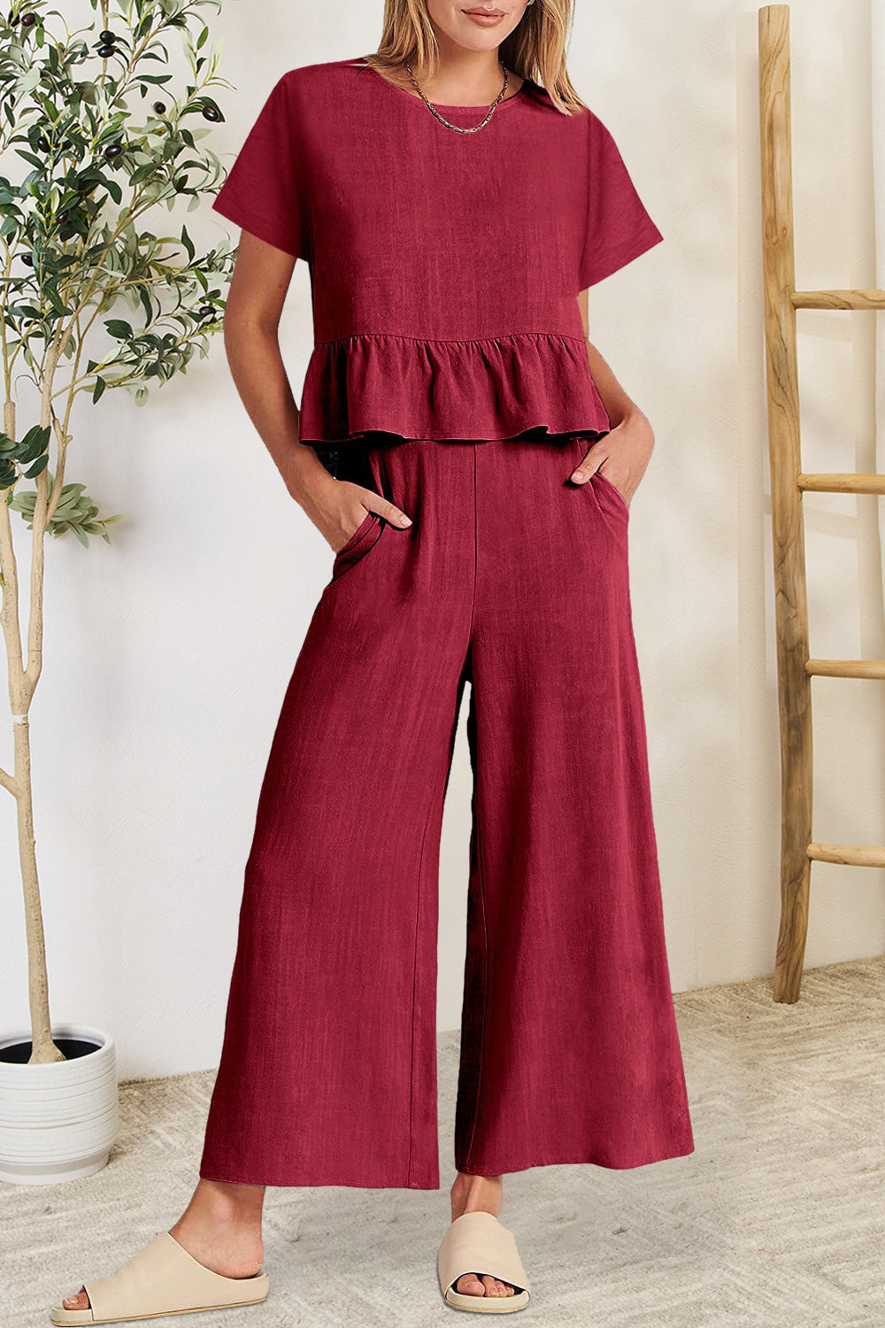 BELLA Trendsi peplum round neck short sleeve top and matching pants set, stylish and comfortable women's clothing ensemble.