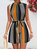 BELLA Tied Color Block Sleeveless Romper from Trendsi, featuring a vibrant color block design and sleeveless style, perfect for summer wear.
