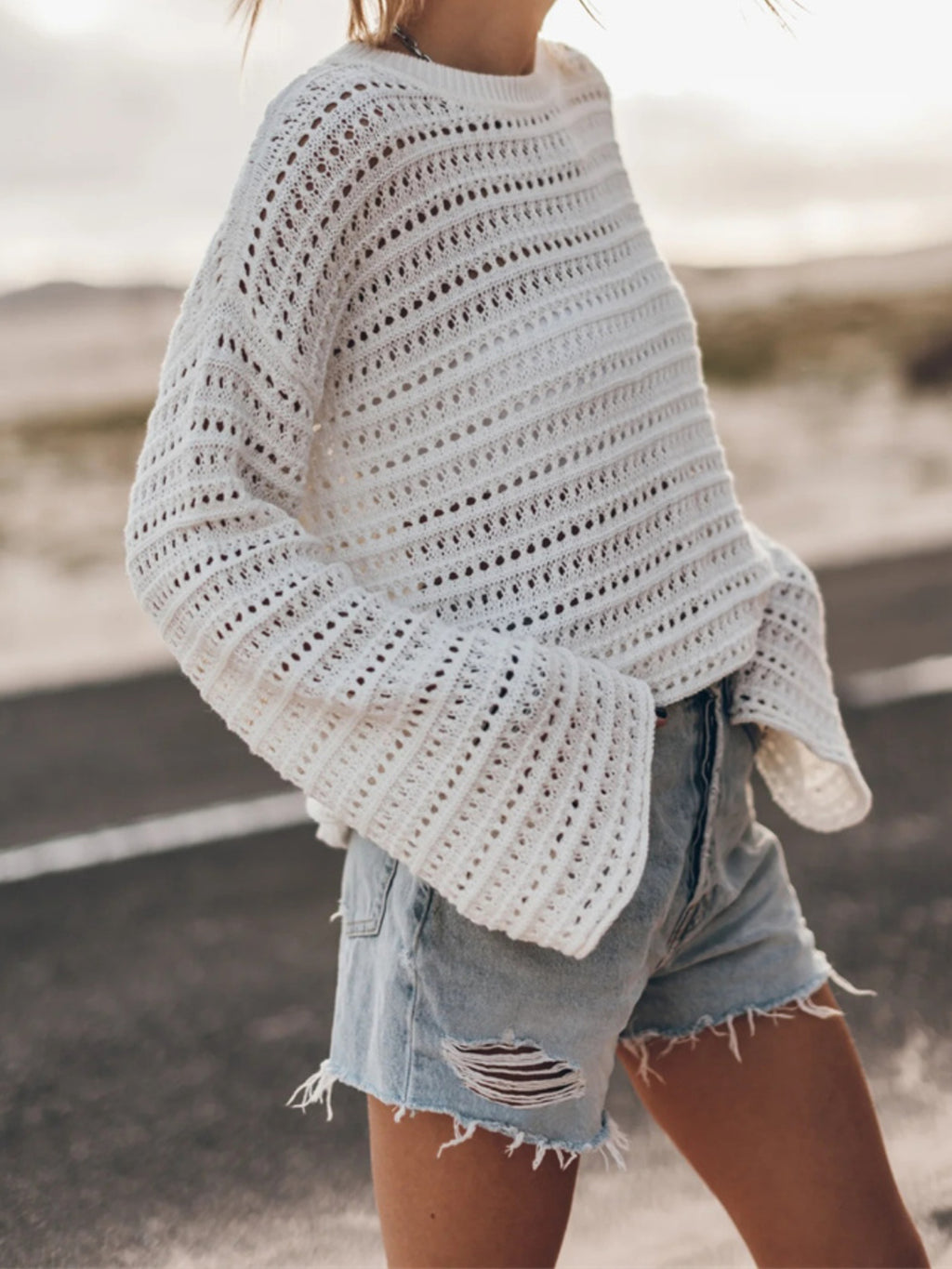 BELLA openwork round neck dropped shoulder knit top, stylish lightweight sweater with intricate openwork design and relaxed fit.