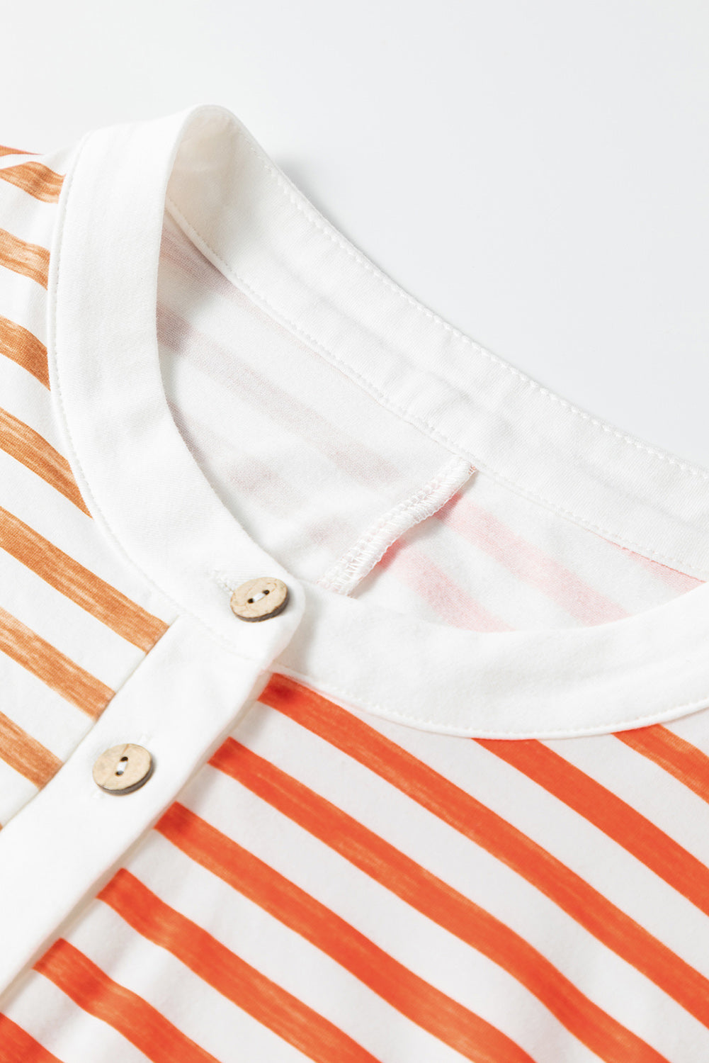 BELLA striped sleeveless jumpsuit with round neckline and bold vertical stripes, casual and stylish for warm weather.