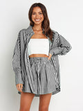 BELLA striped dropped shoulder shirt and matching shorts set, casual summer outfit with blue and white vertical stripes.