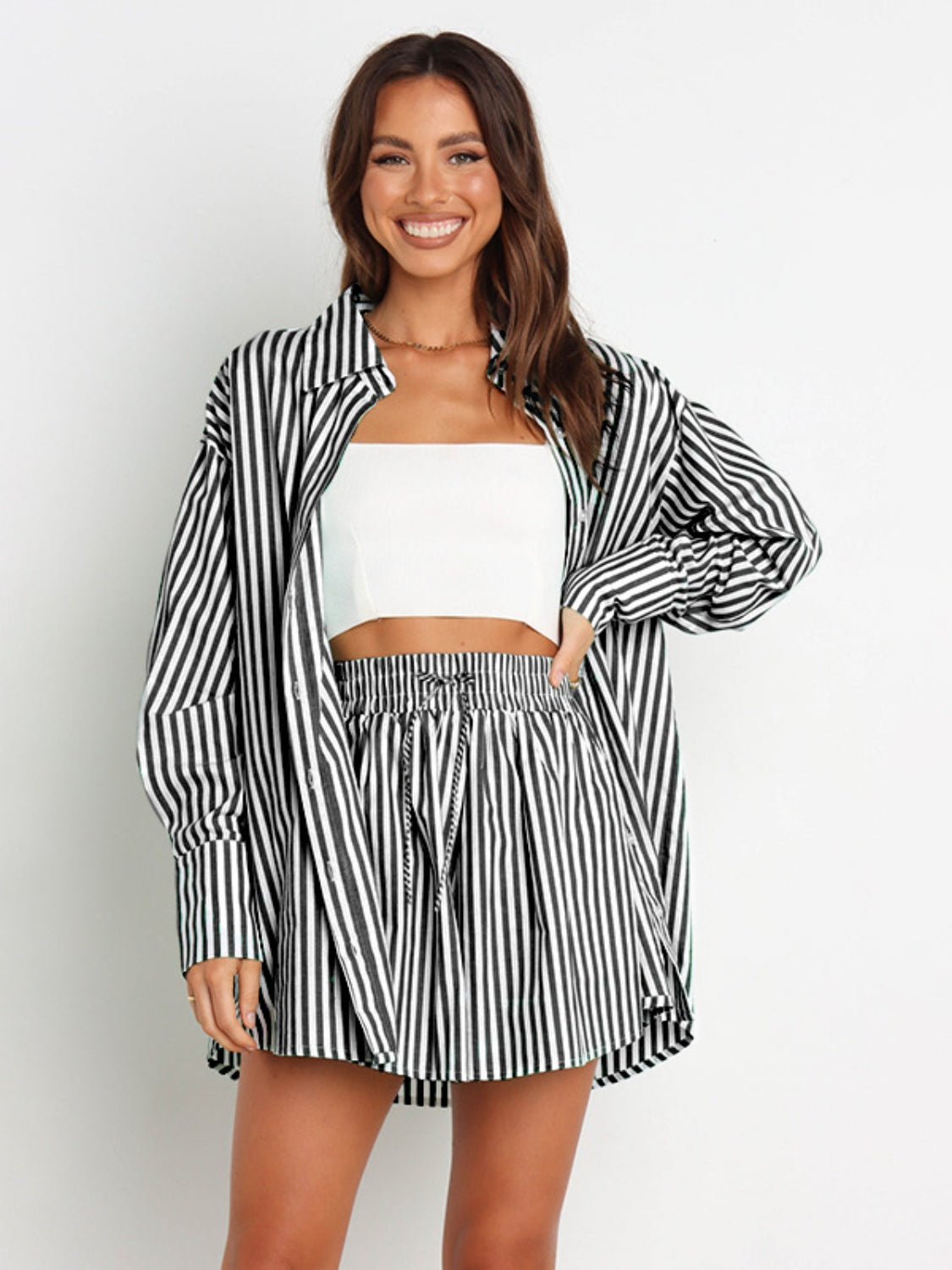 BELLA striped dropped shoulder shirt and matching shorts set, casual summer outfit with blue and white vertical stripes.