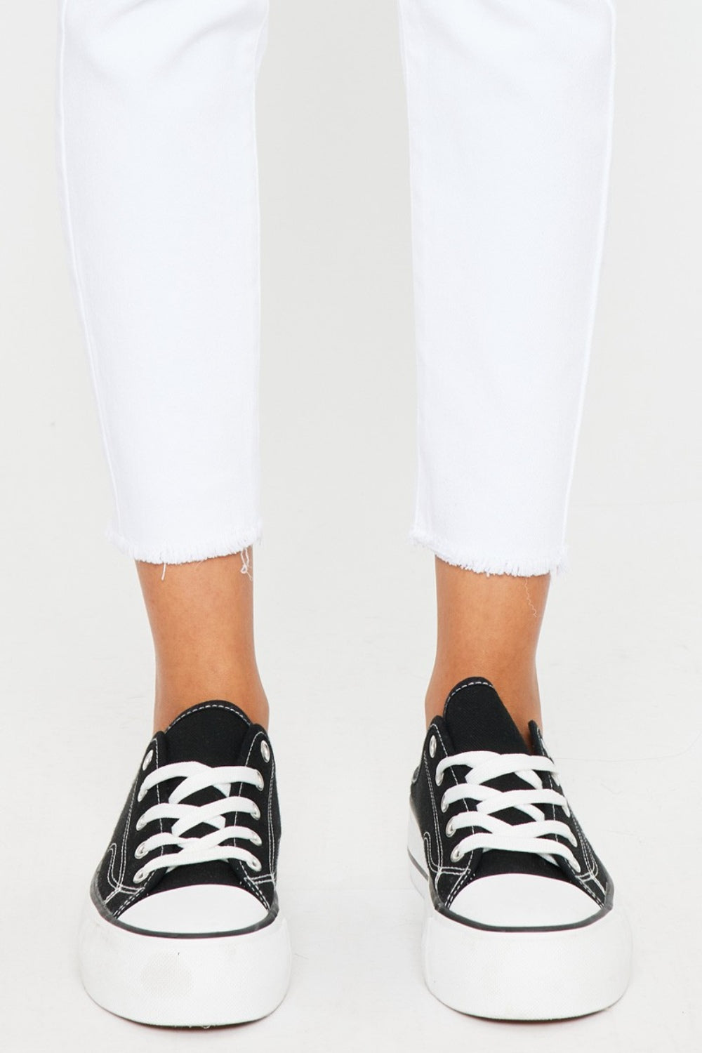BELLA Kancan mid-rise ankle skinny jeans in dark wash, featuring a fitted silhouette and classic denim details.