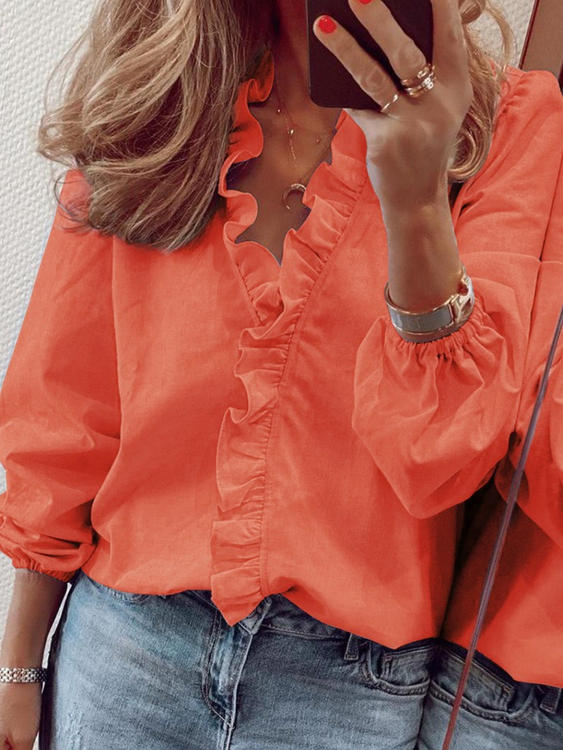 Full size BELLA BLA ruffled V-neck long sleeve blouse with feminine details and a relaxed fit, perfect for casual or dressy occasions.