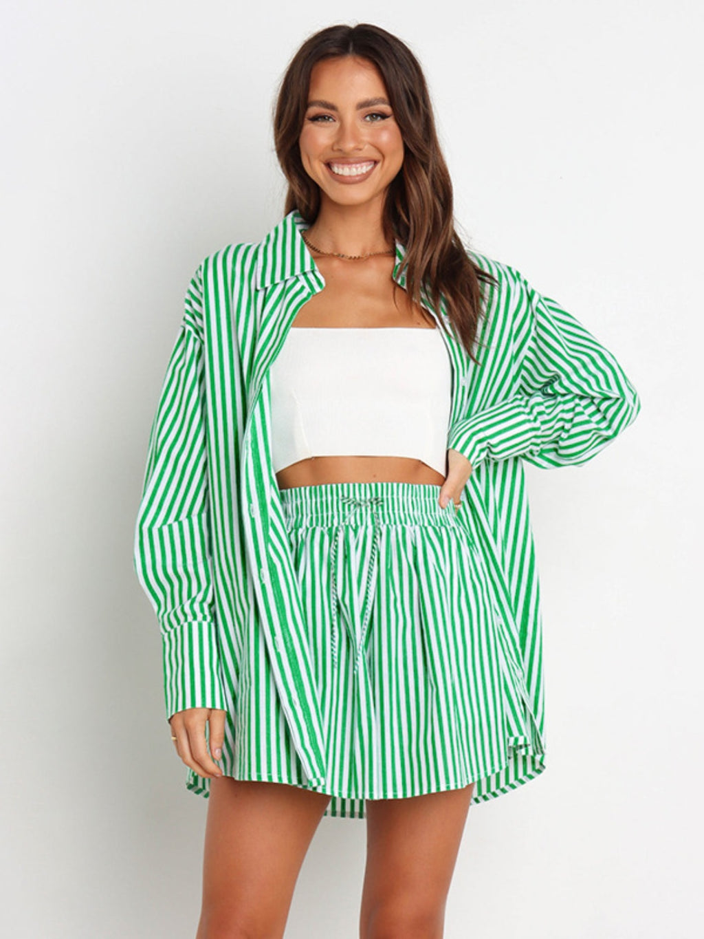 Striped Bella Trendsi dropped shoulder shirt and shorts set, featuring a casual, stylish design with bold stripes and relaxed fit.