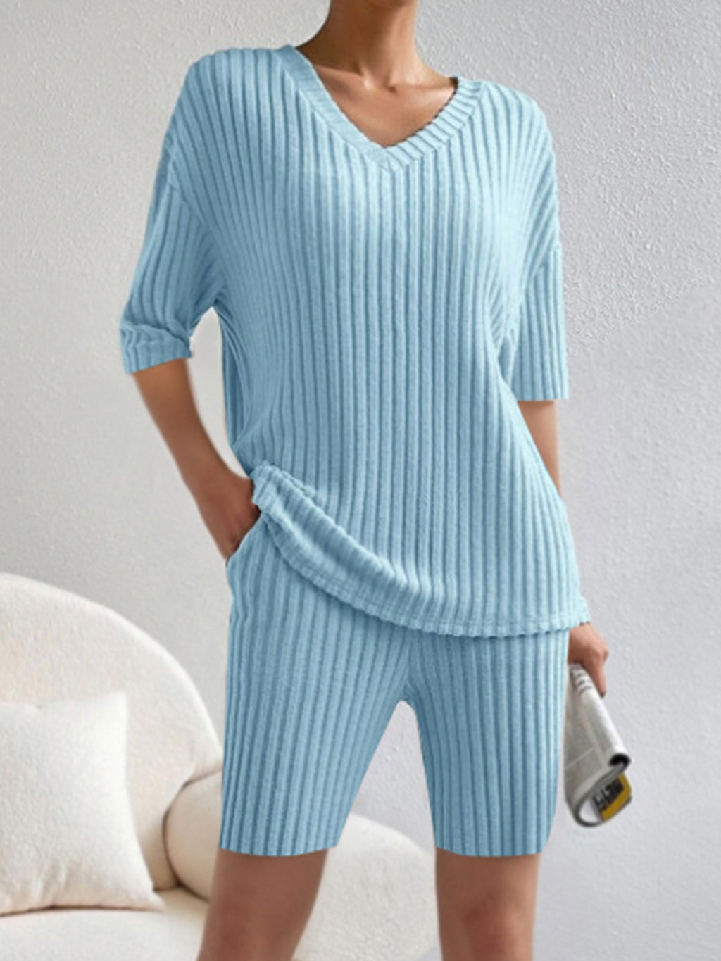BELLA ribbed V-neck top and matching shorts set in a stylish, fitted design, perfect for casual and trendy wear.