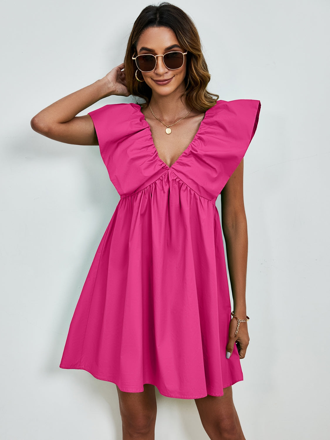 BELLA V-Neck Cap Sleeve Mini Dress in lightweight fabric, featuring a fitted silhouette and stylish v-neck design.