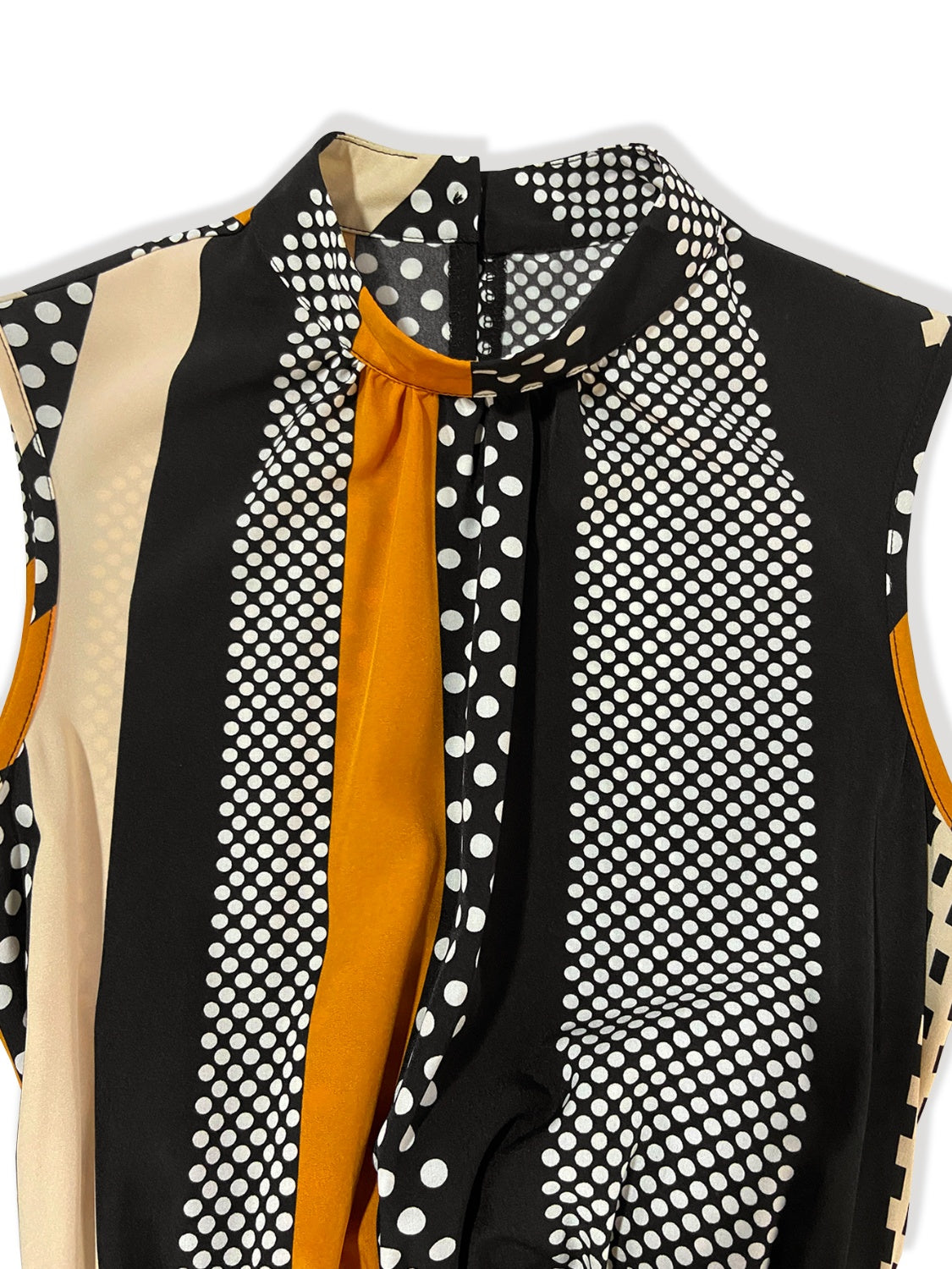 BELLA Tied Color Block Sleeveless Romper featuring a stylish, sleeveless design with bold color blocking details.