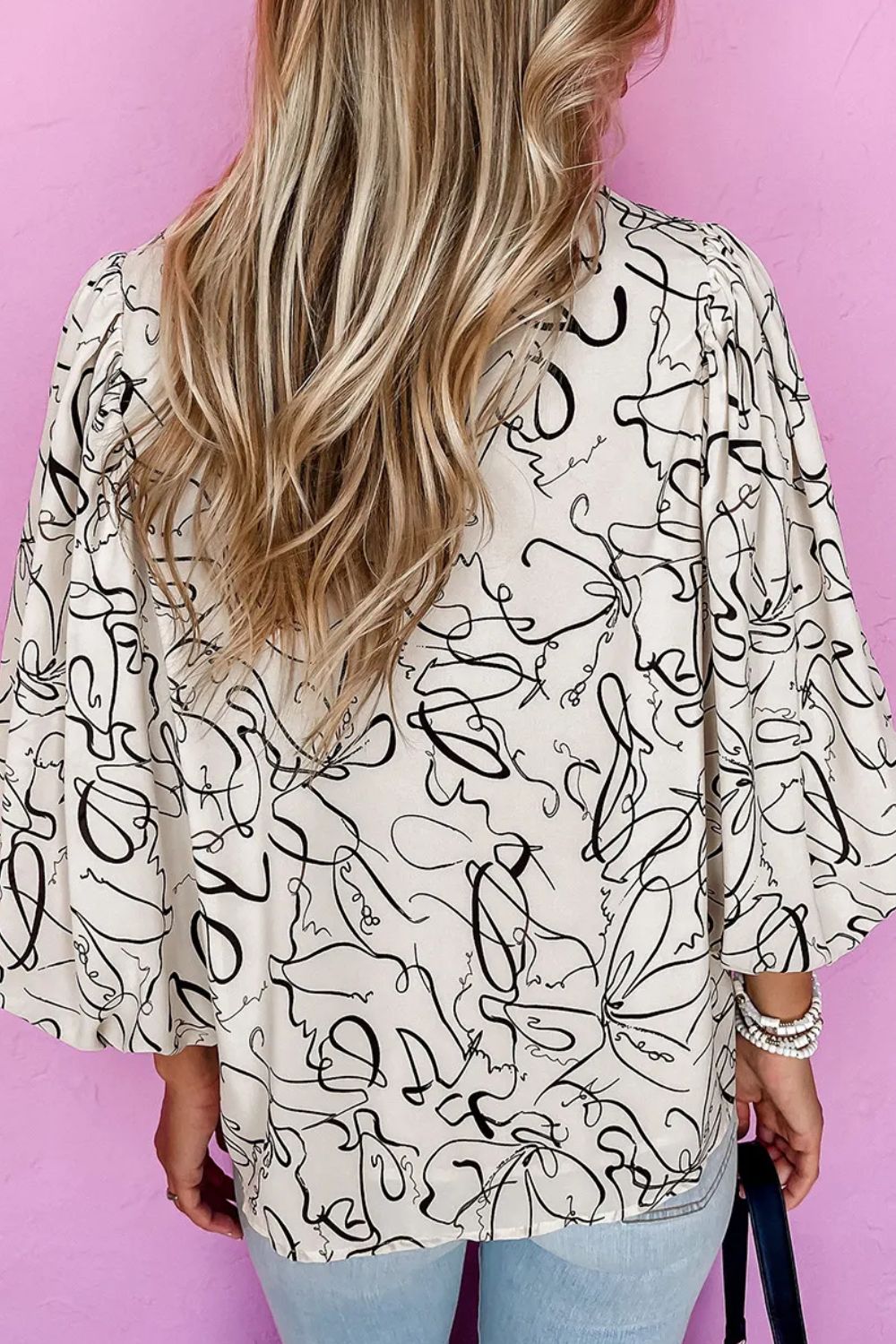 Printed round neck three-quarter sleeve blouse by BELLA BLA, featuring a stylish design and comfortable fit, shown on a model.