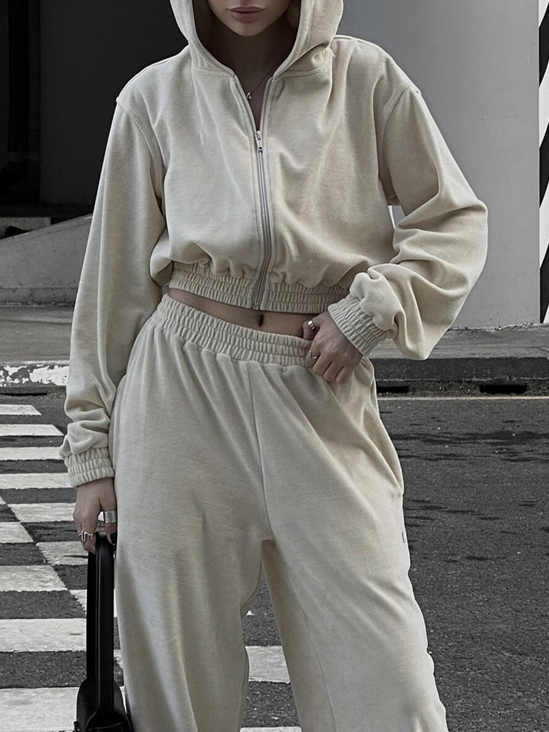 BELLA BLA zip-up hoodie and pocketed pants set with casual fit, featuring a soft fabric and relaxed style.