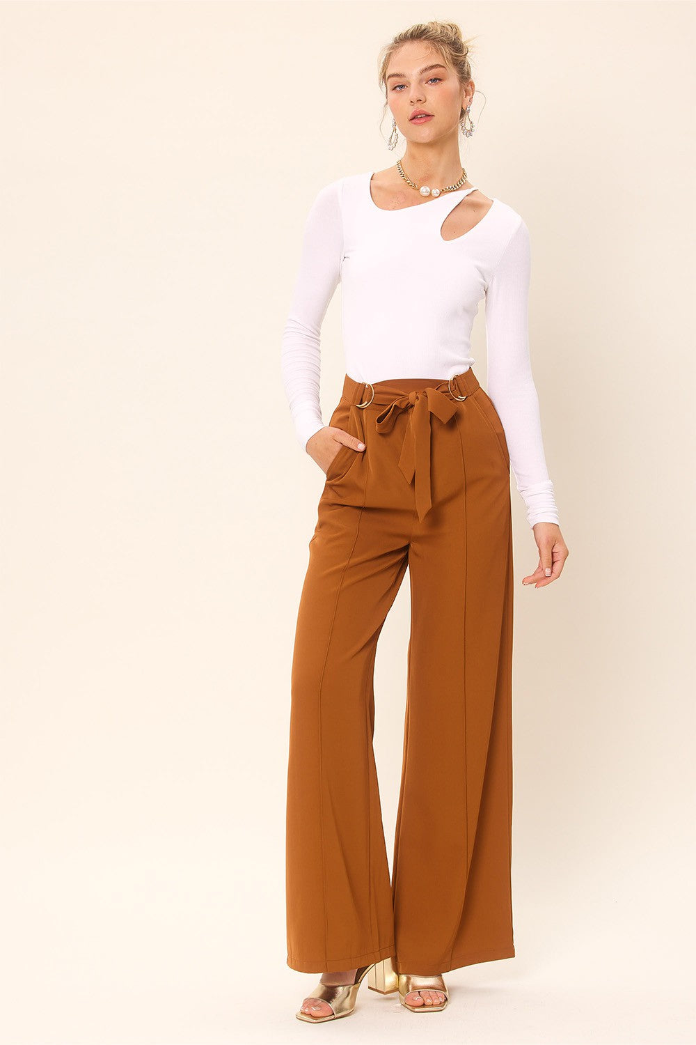 Bella Idem Ditto front cut out long sleeve knit top, trendy women's long sleeve sweater with stylish cutouts and knit texture.